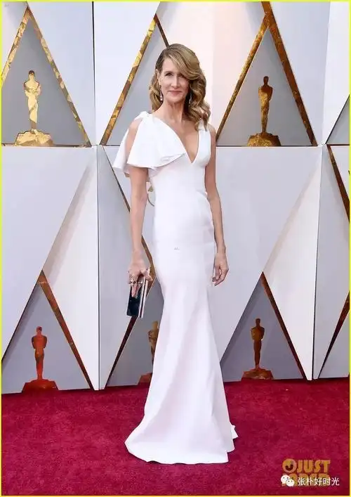 laura dern in a sleek white gownemily blunt wears in a light