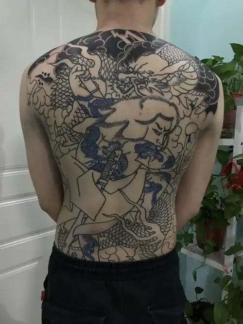 郑州纹身花雾刺青老传统满背九纹龙史进