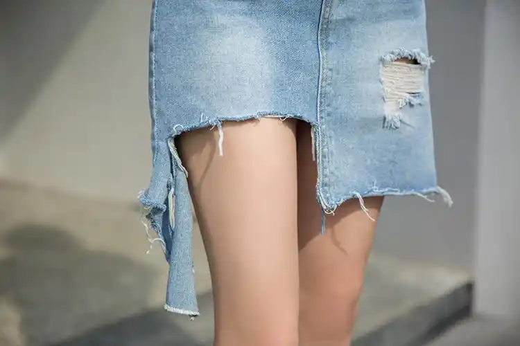 潮流不规则边破烂牛仔裙女毛边破洞半身裙修身百搭a字短裙夏0999
