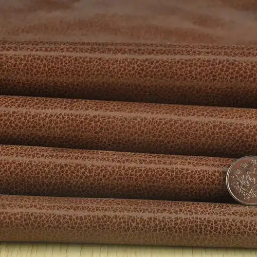 头层深棕色龟裂表带牛皮皮料批发 订做爆裂纹牛皮皮革厂家