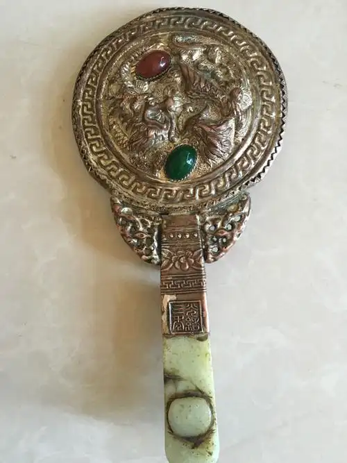 问:求大师指点下,真假几成?懂得来.水手绕行!