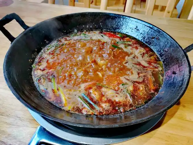 贵阳地摊火锅豆豉火锅豆豉因为发酵过所以有特殊香气但可接受切片猪肉