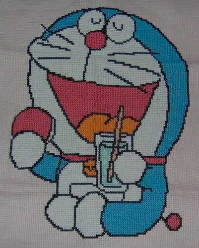 展开全部 我有张十字绣的多啦a梦吃铜锣烧的图片,希望你喜欢