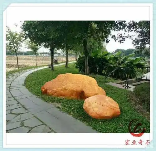 公园草坪点缀石黄蜡石价格,园林景观石黄蜡石原石产地