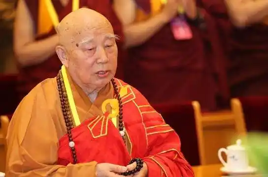 乃吉林辽源弥陀寺名尼能述法师亲弟.