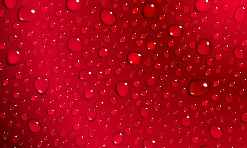 红色背景的水滴图片