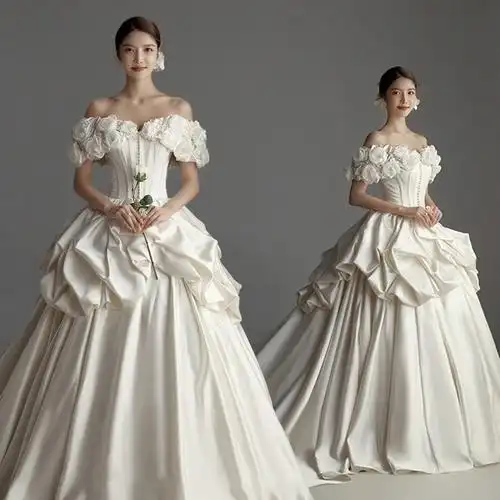 影楼新款主题服装情侣写真拍照礼服韩版长拖尾一字肩花朵缎面婚纱