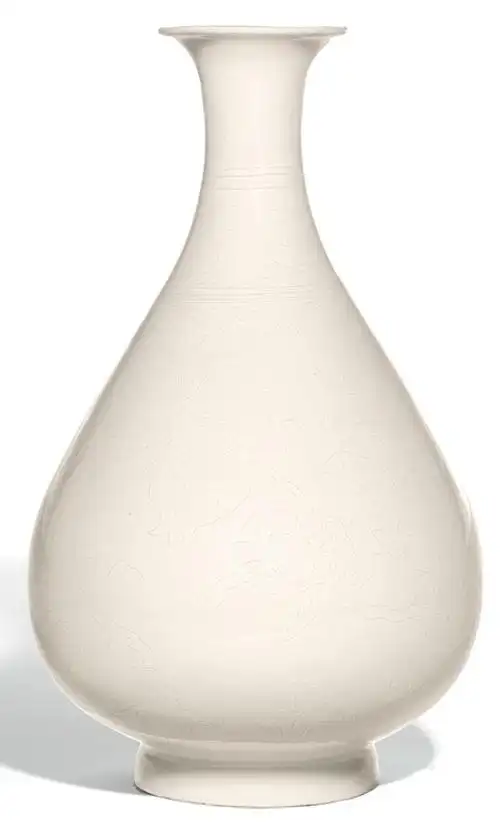 明永乐甜白釉暗刻石榴花果纹玉壶春瓶