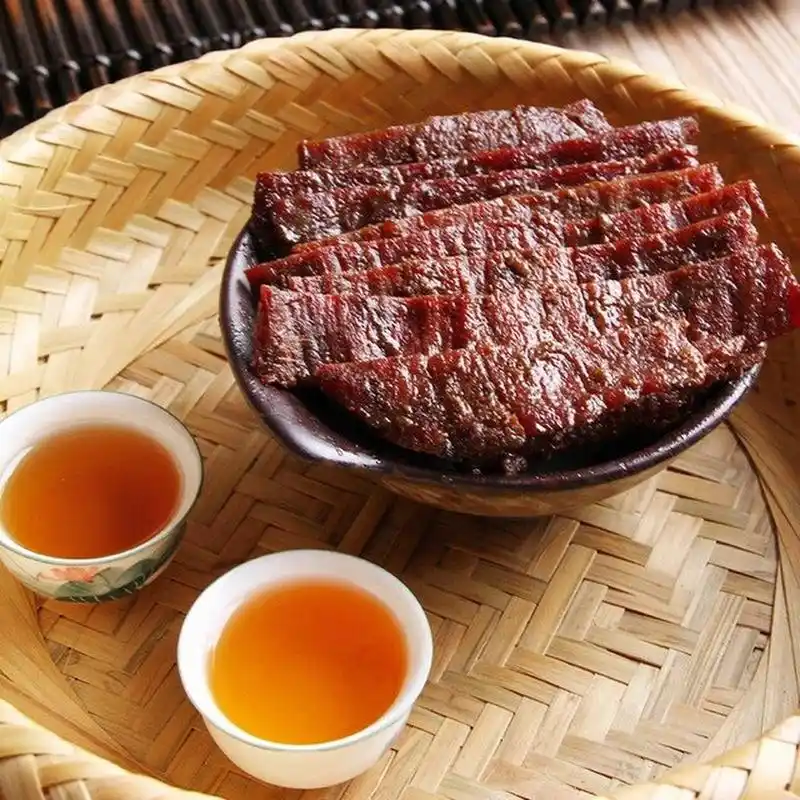 好有嚼味的牛巴 玉林牛巴是我们广西玉林当地的特色美食,玉林牛巴颜色