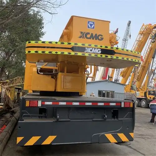 4, 50吨的吊车可以吊4吨的重物多远?