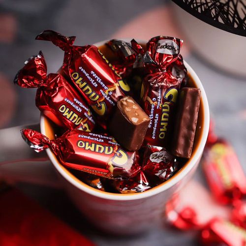 巧克力俄罗斯kpokaht紫皮糖果婚庆喜糖杏仁夹心果仁传统糖果