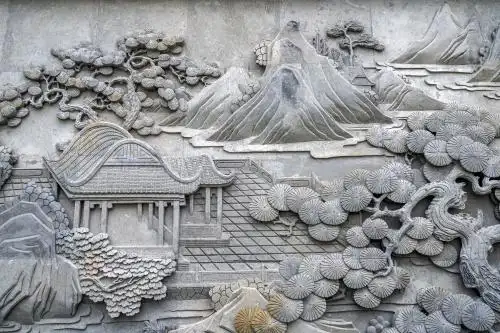中式古典园林建筑的石雕山水画影壁墙