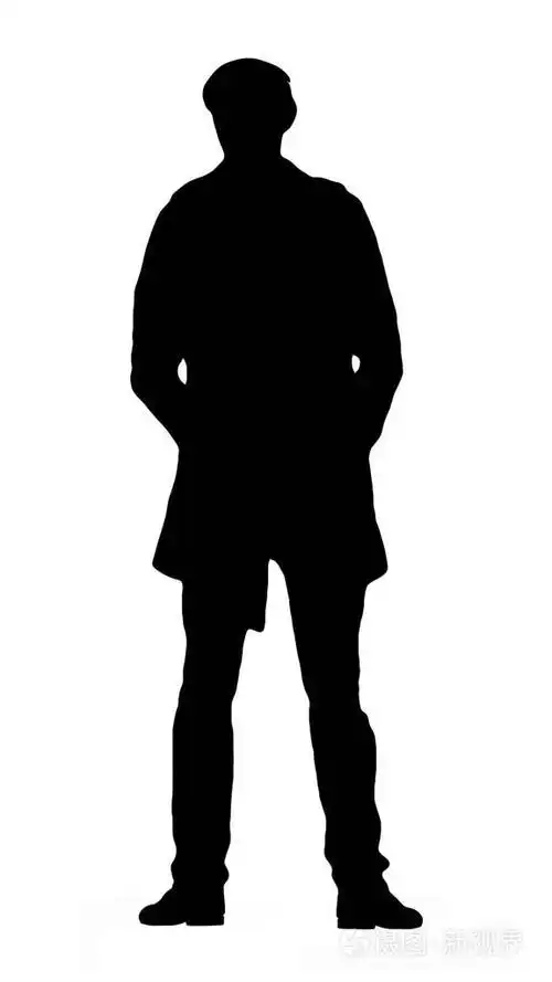 黑色的轮廓,一个成年人,苗条和年轻人站在等待的姿势和手在口袋的裤子