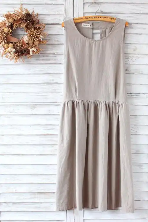 日系森女纯色露背侧边纽扣连衣裙 棉麻连衣裙 学院风长裙 百搭款.