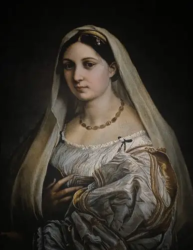 拉斐尔后期最负盛名的圣母像就有这幅《椅中圣母》,他借圆框画