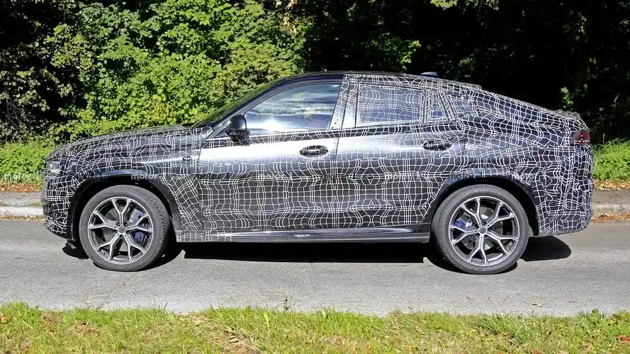 全新宝马x6假想图曝光 宝马x5的前脸 溜背轿跑suv风格