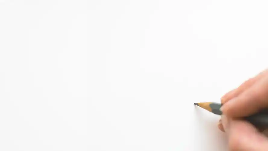 手握铅笔写字白底高清背景图片