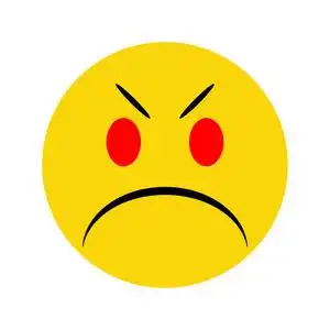 生气的黄色笑脸与阴影照片