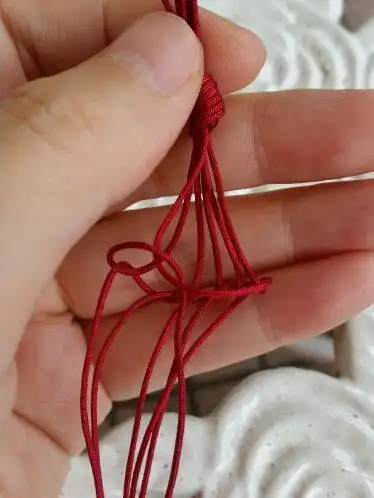 绳编宝宝护身符手绳的方法