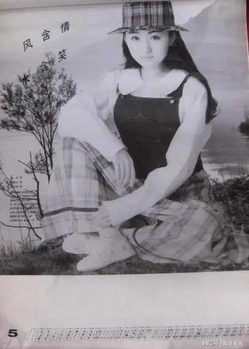 因出众美貌杨钰莹成为唯一一个能够占据整本挂历的女歌手