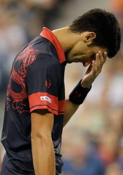 图文:男单次轮小德vs普兹斯内尔 深深自责