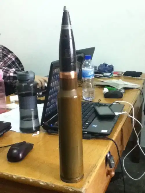 朋友送我一颗炮弹,不知道是什么型号~~~请各位大侠看看有认识的没有