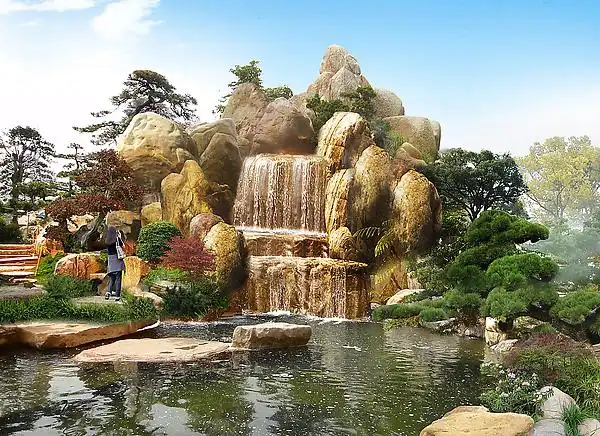 塑石假山流水效果图_绿人园林景观