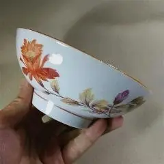 50,60年代浙江绍兴瓷厂全品花卉碗口径14高5.5厘米左右,底款"浙江绍兴