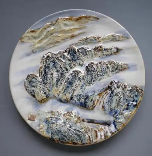 黄淦生的陶塑浮雕山水盘