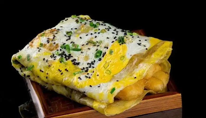 津门美食传奇:煎饼果子