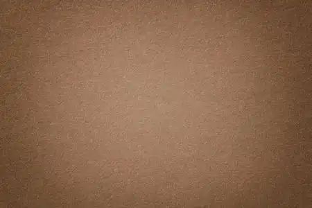 浅棕色亚光麂皮面料特写.毛毡的天鹅绒质地.照片