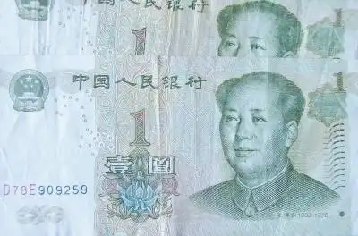 3人用剪刀浆糊伪造"错版人民币"骗13万(图)