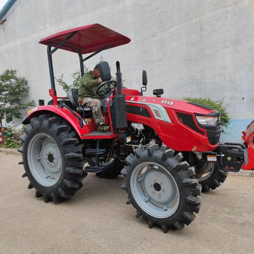 地四轮904东方红拖机力价格 水田轮504高配东方红70拉马旋耕打田