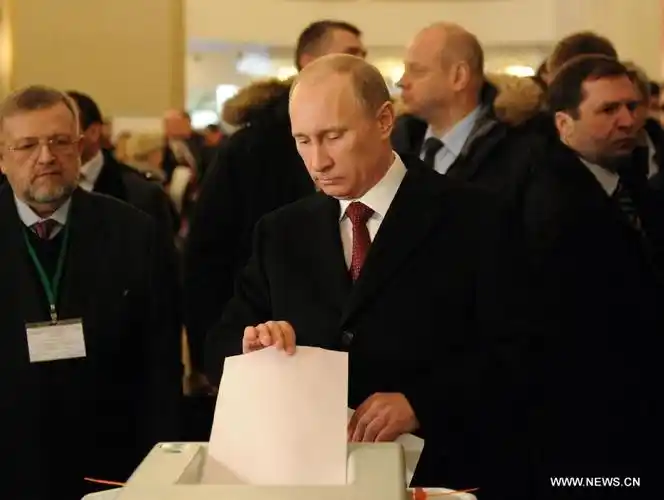 putin casts vote for presidential election