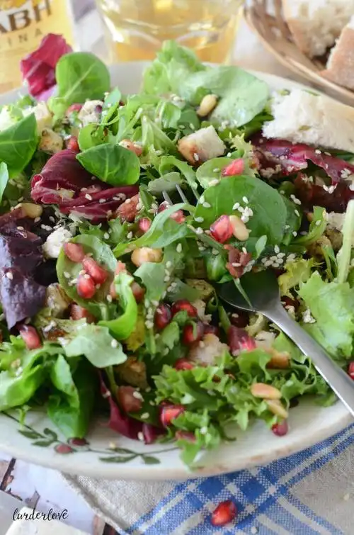 green salad with pomegranate and smoked pork (avli salad)
