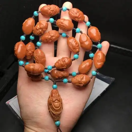 文玩爆款十八罗汉小籽手持款苏工核雕橄榄核手工雕刻手串脖挂挂脖