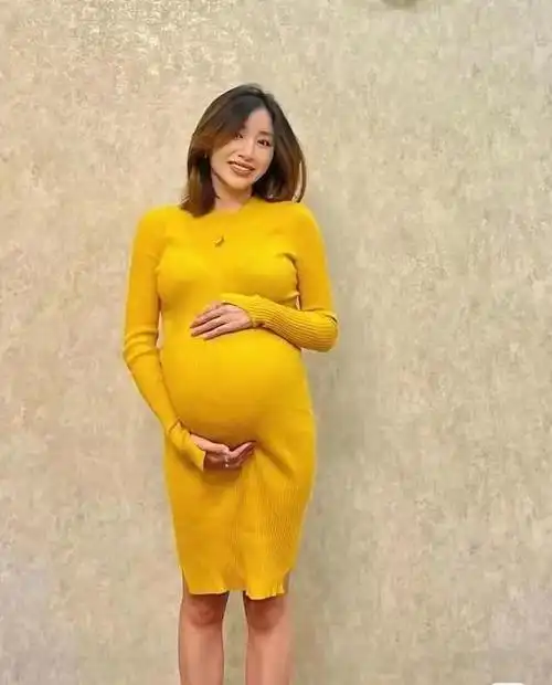 体操女神周捷:嫁1米58奥运五冠王,如今儿女双全身材依旧傲人