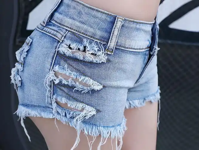 谆轩超短露臀性感外穿低腰紧身热裤女毛边流苏镂空破洞显瘦低腰牛仔裤