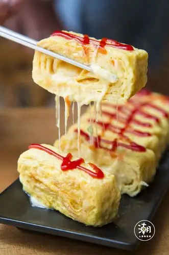 奶酪鸡蛋卷是很多女孩子的必点,嫩滑的鸡蛋里堆满缠绵的浓郁芝士