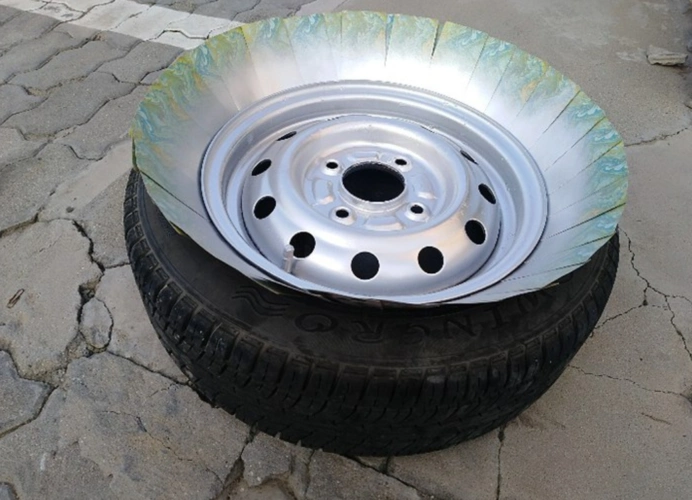 铁圈轮毂永放光芒