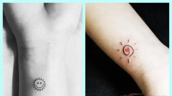 简笔画式的小太阳纹身虽然简单但也可爱,小小的圆中印着一个笑脸,不