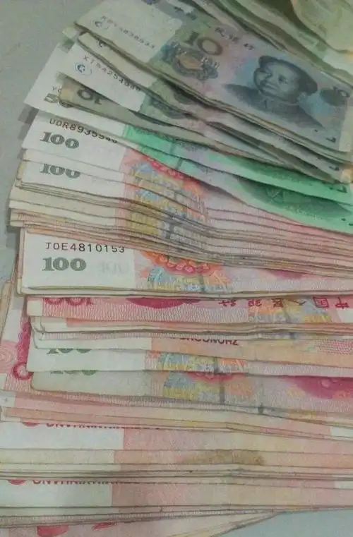 问题一一万元钱多少斤 如果全是一百一张的是三两如果是一元硬币76斤