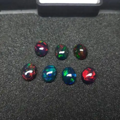 高品质8x10mm椭圆形天然埃塞俄比亚黑蛋白石弧面形松散宝石制作珠宝