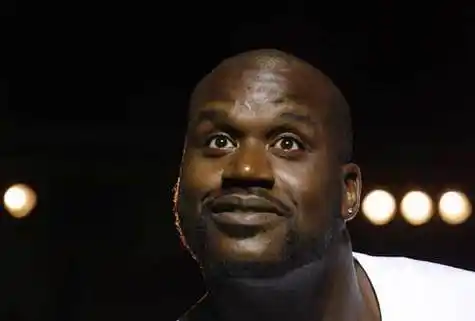 图文:[nba]奥尼尔出席篮球挑战赛 鲨鱼表情可爱