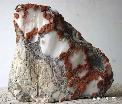 白灵璧石是天然的吗还是有人工修饰过