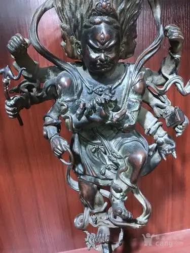 紫铜三头六臂佛像