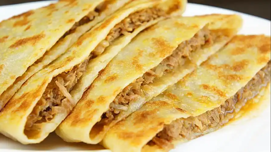 河北香河肉饼皮薄肉厚味道长,既可当菜也可作主食,有两百多年历史乾隆