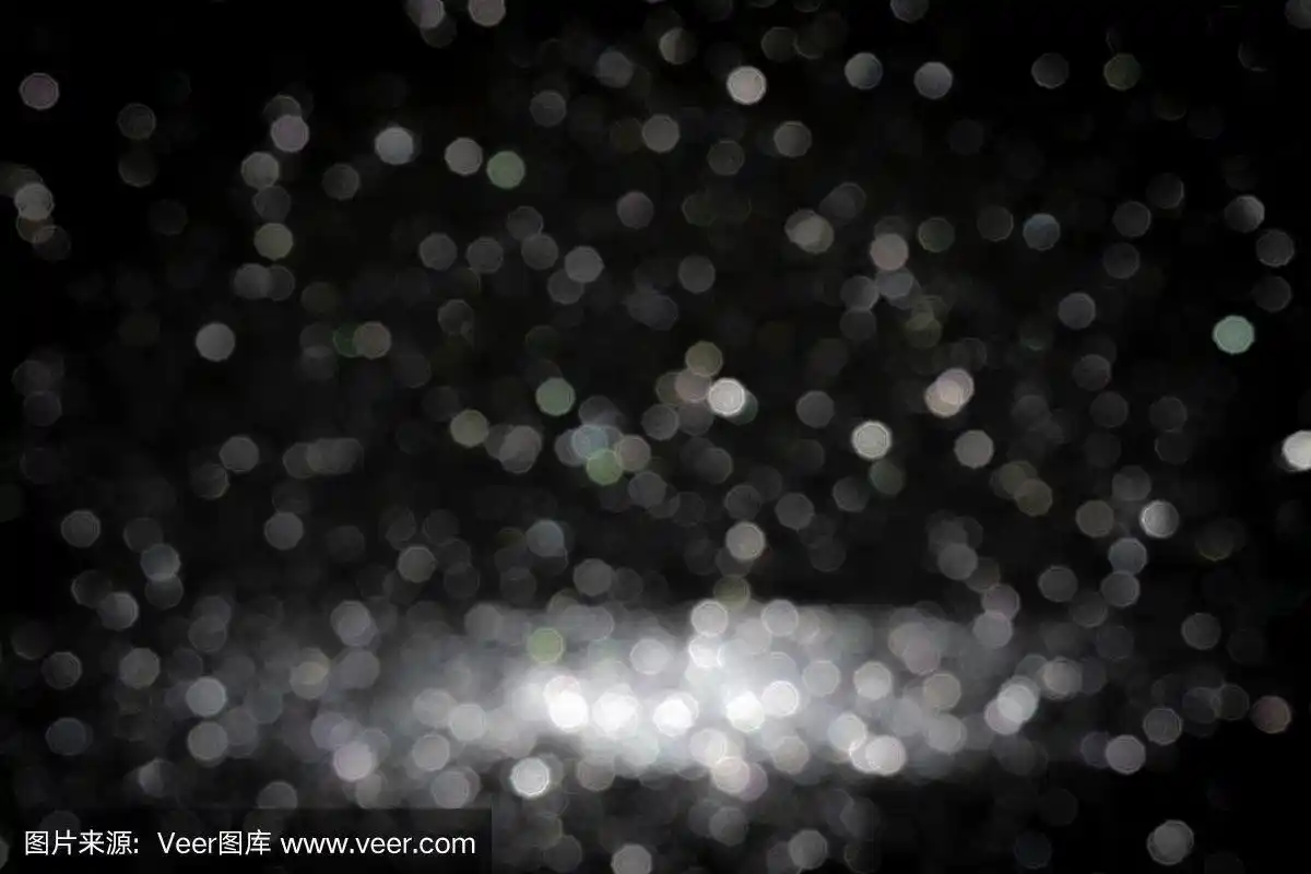 黑色背景的圣诞海军闪闪发光.抽象的散景,灯光闪亮,黑暗的节日.