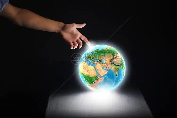 地球行星用手指近距离接触地球行星这幅图像的元素由美国宇航局提供的