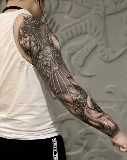 凤凰花臂纹身图片_手部手臂新传统凤凰花臂纹身图案(5)_浙江省杭州市